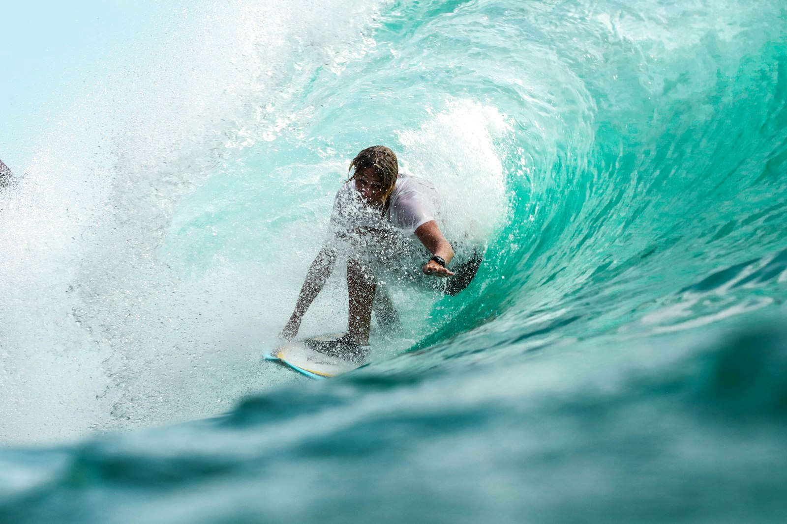 Surfer walking to the water